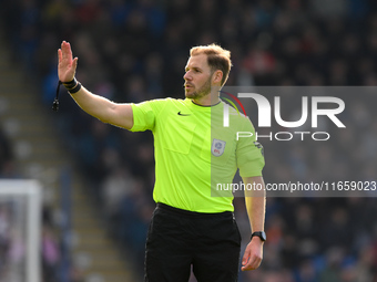 Referee Matthew Corlett gestures during the Sky Bet League 2 match between Chesterfield and Notts County at the SMH Group Stadium in Chester...