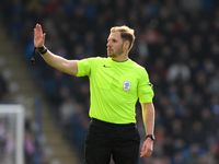 Referee Matthew Corlett gestures during the Sky Bet League 2 match between Chesterfield and Notts County at the SMH Group Stadium in Chester...