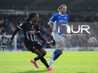 Jevani Brown of Notts County crosses the ball during the Sky Bet League 2 match between Chesterfield and Notts County at the SMH Group Stadi...