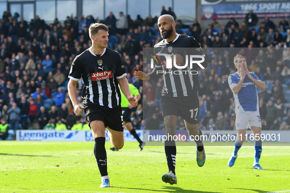 David McGoldrick of Notts County celebrates with Matthew Platt of Notts County after scoring a goal to make it 2-2 during the Sky Bet League...