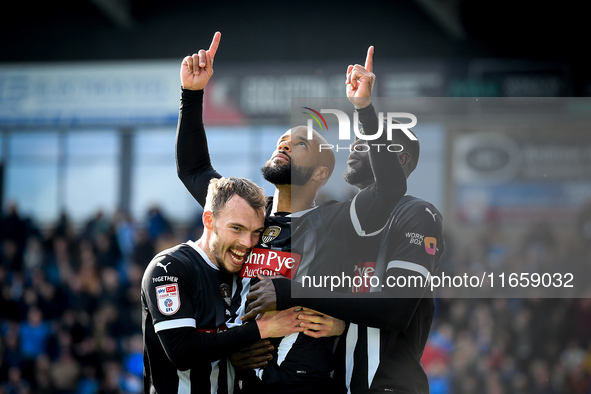 David McGoldrick of Notts County celebrates with his teammates after scoring a goal during the Sky Bet League 2 match between Chesterfield a...