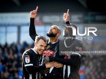 David McGoldrick of Notts County celebrates with his teammates after scoring a goal during the Sky Bet League 2 match between Chesterfield a...