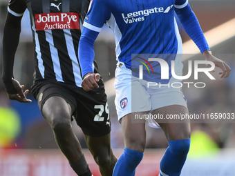 Harvey Araujo of Chesterfield is under pressure from Alassana Jatta of Notts County during the Sky Bet League 2 match between Chesterfield a...