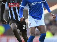 Harvey Araujo of Chesterfield is under pressure from Alassana Jatta of Notts County during the Sky Bet League 2 match between Chesterfield a...