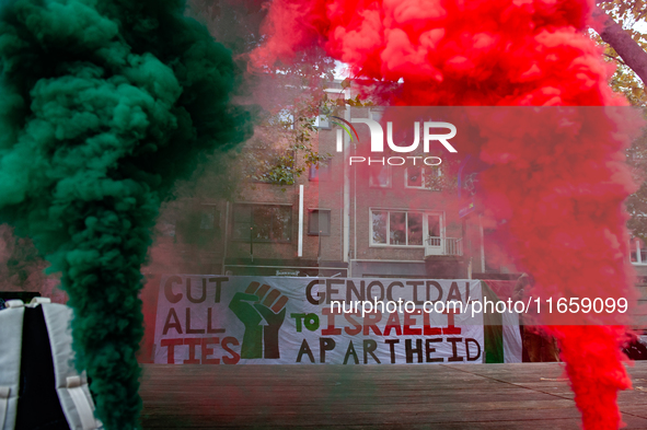 Around two hundred people march along the city center of Nijmegen, Netherlands, on October 12, 2024, to show their support for Palestine and...