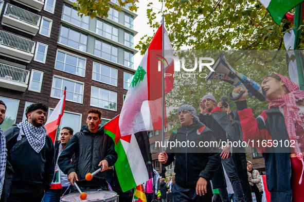 Around two hundred people march along the city center of Nijmegen, Netherlands, on October 12, 2024, to show their support for Palestine and...