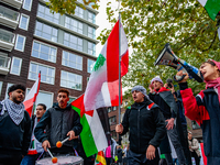 Around two hundred people march along the city center of Nijmegen, Netherlands, on October 12, 2024, to show their support for Palestine and...