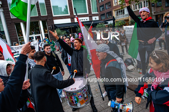 Around two hundred people march along the city center of Nijmegen, Netherlands, on October 12, 2024, to show their support for Palestine and...