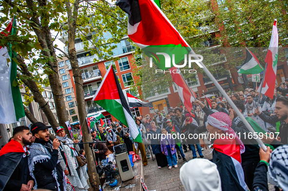 Around two hundred people march along the city center of Nijmegen, Netherlands, on October 12, 2024, to show their support for Palestine and...