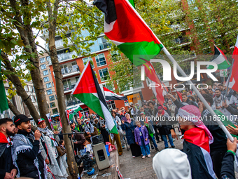 Around two hundred people march along the city center of Nijmegen, Netherlands, on October 12, 2024, to show their support for Palestine and...