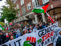 Around two hundred people march along the city center of Nijmegen, Netherlands, on October 12, 2024, to show their support for Palestine and...