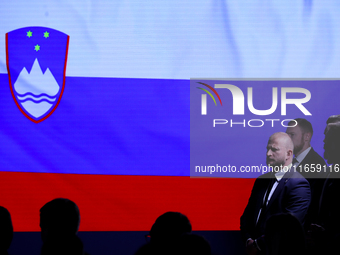 The Slovenia flag is with people during the meeting of the presidents of the Arraiolos group at Wawel Castle in Krakow, Poland, on October 1...