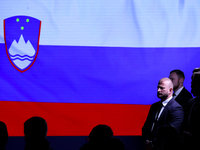 The Slovenia flag is with people during the meeting of the presidents of the Arraiolos group at Wawel Castle in Krakow, Poland, on October 1...