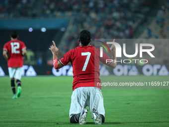 Mahmoud Ahmed of Egypt celebrates after he scores the first goal during the Africa Cup of Nations Qualifiers 2025 match number 61 between Eg...