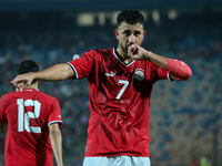 Mahmoud Ahmed of Egypt celebrates after he scores the first goal during the Africa Cup of Nations Qualifiers 2025 match number 61 between Eg...