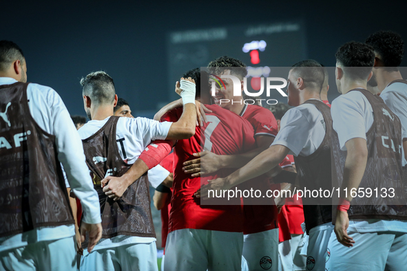 Mahmoud Ahmed of Egypt celebrates with a teammate after scoring the first goal during the Africa Cup of Nations Qualifiers 2025, match numbe...