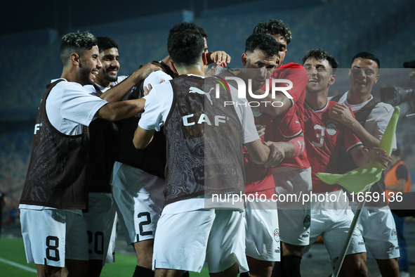 Mahmoud Ahmed of Egypt celebrates with a teammate after scoring the first goal during the Africa Cup of Nations Qualifiers 2025, match numbe...