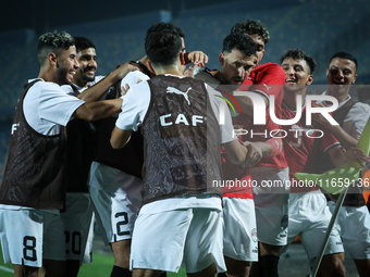 Mahmoud Ahmed of Egypt celebrates with a teammate after scoring the first goal during the Africa Cup of Nations Qualifiers 2025, match numbe...