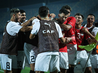 Mahmoud Ahmed of Egypt celebrates with a teammate after scoring the first goal during the Africa Cup of Nations Qualifiers 2025, match numbe...