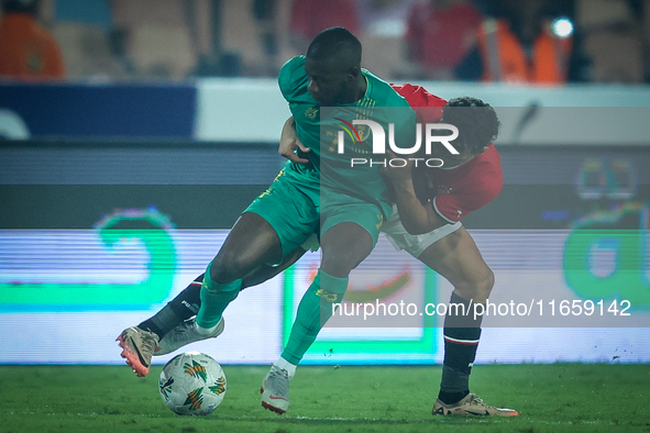 Ahmed Eid of Egypt battles for possession with Aboubakary Koita of Mauritania during the Africa Cup of Nations Qualifiers 2025, match number...