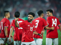 Mohamed Salah of Egypt celebrates with a teammate after scoring the second goal during the Africa Cup of Nations Qualifiers 2025, match numb...