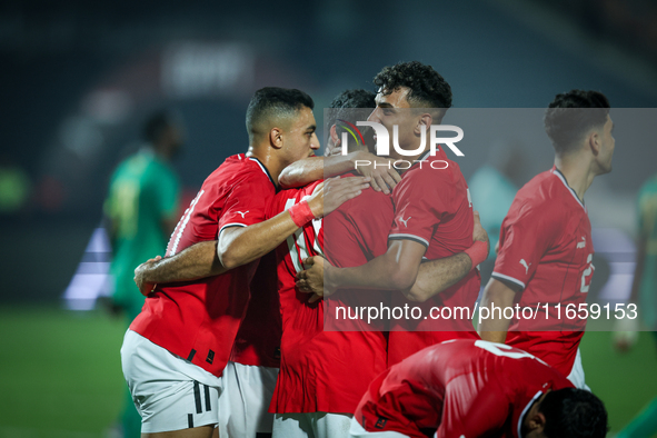 Mohamed Salah of Egypt celebrates with a teammate after scoring the second goal during the Africa Cup of Nations Qualifiers 2025, match numb...