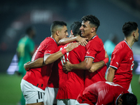 Mohamed Salah of Egypt celebrates with a teammate after scoring the second goal during the Africa Cup of Nations Qualifiers 2025, match numb...