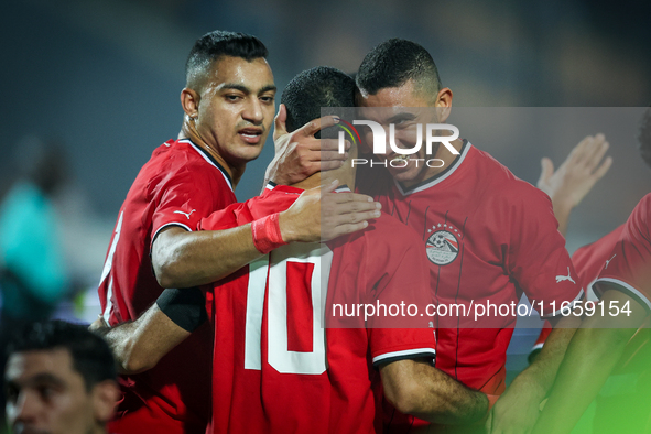 Mohamed Salah of Egypt celebrates with a teammate after scoring the second goal during the Africa Cup of Nations Qualifiers 2025, match numb...