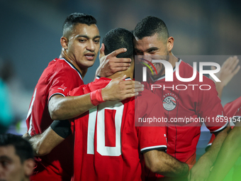 Mohamed Salah of Egypt celebrates with a teammate after scoring the second goal during the Africa Cup of Nations Qualifiers 2025, match numb...