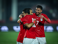 Mohamed Salah of Egypt celebrates with a teammate after scoring the second goal during the Africa Cup of Nations Qualifiers 2025, match numb...