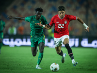 Omar Marmoush of Egypt battles for possession with Idrissa Thiam of Mauritania during Africa Cup of Nations Qualifiers 2025 match number 61...