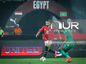 Mohamed Salah of Egypt battles for possession with Abeid Aly of Mauritania during the Africa Cup of Nations Qualifiers 2025 match number 61...