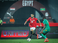 Mohamed Salah of Egypt battles for possession with Abeid Aly of Mauritania during the Africa Cup of Nations Qualifiers 2025 match number 61...