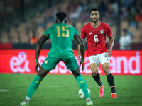 Mohamed Abdelmoneim of Egypt battles for possession with Papa Ndiaga Yade of Mauritania during the Africa Cup of Nations Qualifiers 2025, ma...