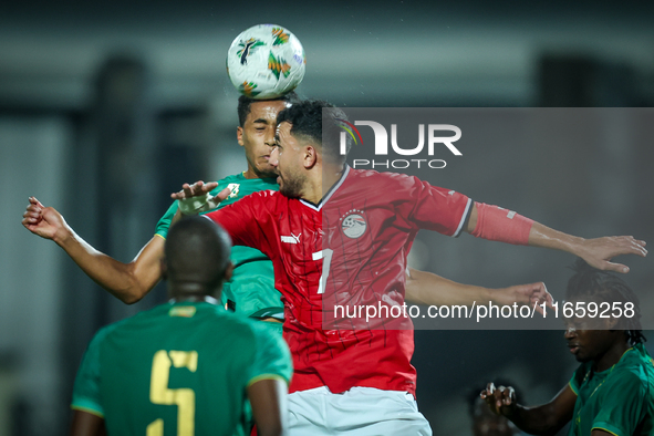 Mahmoud Ahmed of Egypt battles for possession with Oumar Jacky Ngom of Mauritania during the Africa Cup of Nations qualifiers 2025, match nu...