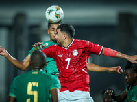 Mahmoud Ahmed of Egypt battles for possession with Oumar Jacky Ngom of Mauritania during the Africa Cup of Nations qualifiers 2025, match nu...