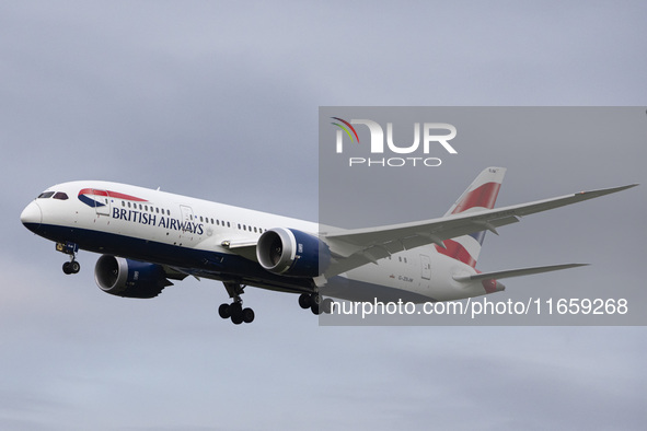 British Airways Boeing 787-8 Dreamliner aircraft spotted flying on final approach over the roofs of the houses of Myrtle avenue for landing...