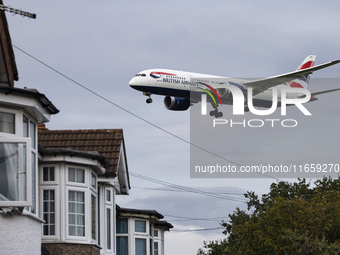 British Airways Boeing 787-8 Dreamliner aircraft spotted flying on final approach over the roofs of the houses of Myrtle avenue for landing...