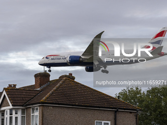 British Airways Boeing 787-8 Dreamliner aircraft spotted flying on final approach over the roofs of the houses of Myrtle avenue for landing...