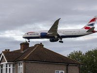 British Airways Boeing 787-8 Dreamliner aircraft spotted flying on final approach over the roofs of the houses of Myrtle avenue for landing...