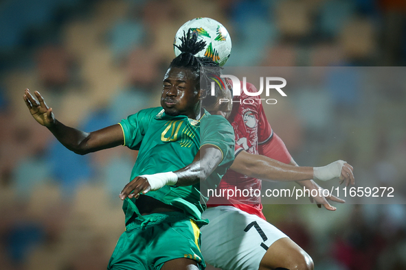 Mahmoud Ahmed of Egypt battles for possession with Keita Ibrahima of Mauritania during the Africa Cup of Nations Qualifiers 2025 match numbe...