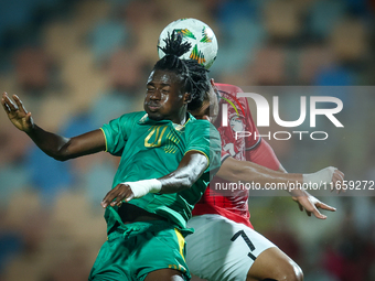 Mahmoud Ahmed of Egypt battles for possession with Keita Ibrahima of Mauritania during the Africa Cup of Nations Qualifiers 2025 match numbe...