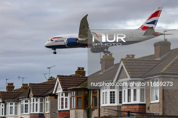 British Airways Boeing 787-8 Dreamliner aircraft spotted flying on final approach over the roofs of the houses of Myrtle avenue for landing...