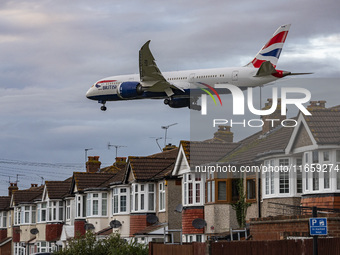 British Airways Boeing 787-8 Dreamliner aircraft spotted flying on final approach over the roofs of the houses of Myrtle avenue for landing...