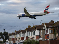 British Airways Boeing 787-8 Dreamliner aircraft spotted flying on final approach over the roofs of the houses of Myrtle avenue for landing...