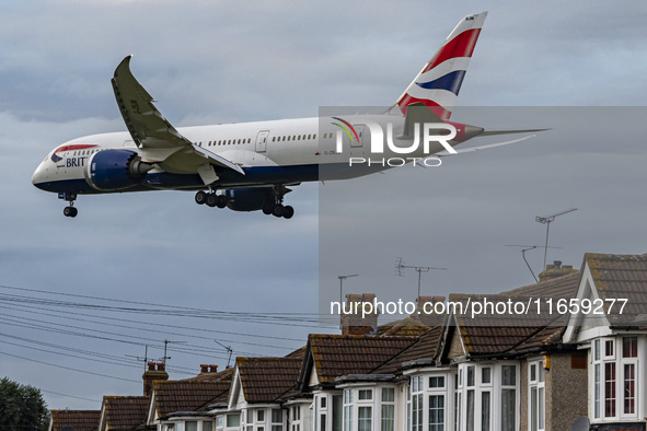 British Airways Boeing 787-8 Dreamliner aircraft spotted flying on final approach over the roofs of the houses of Myrtle avenue for landing...