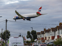 British Airways Boeing 787-8 Dreamliner aircraft spotted flying on final approach over the roofs of the houses of Myrtle avenue for landing...