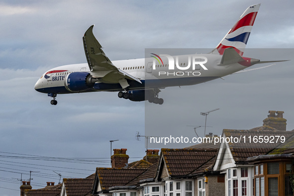 British Airways Boeing 787-8 Dreamliner aircraft spotted flying on final approach over the roofs of the houses of Myrtle avenue for landing...