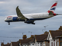 British Airways Boeing 787-8 Dreamliner aircraft spotted flying on final approach over the roofs of the houses of Myrtle avenue for landing...