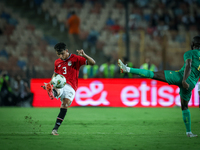 Ahmed Eid of Egypt battles for possession with Aboubakary Koita of Mauritania during the Africa Cup of Nations Qualifiers 2025, match number...